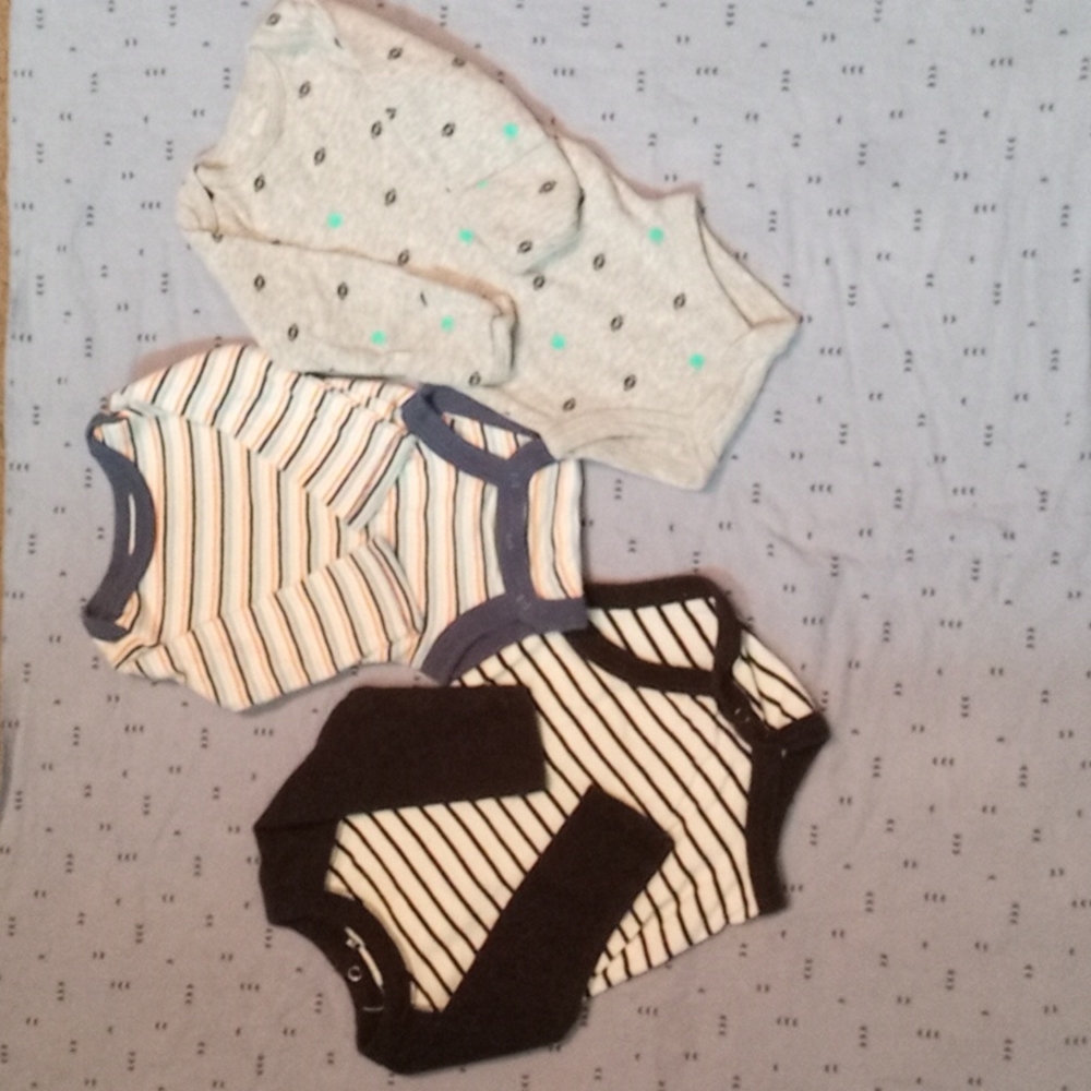 Newborn bundle of 3 long sleeve onesies.